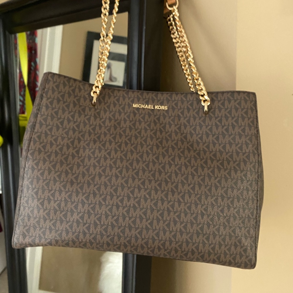 Elegant Black Leather Shoulder Bag with Gold Accents